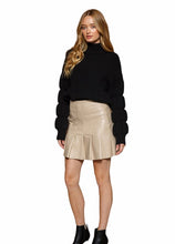 Load image into Gallery viewer, Black knit sweater, with bubble sleeve details, and mock neckline 
